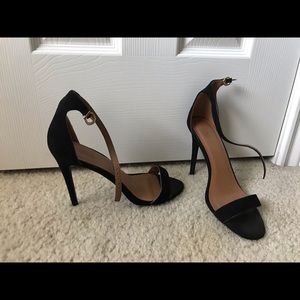 Black strapped heel